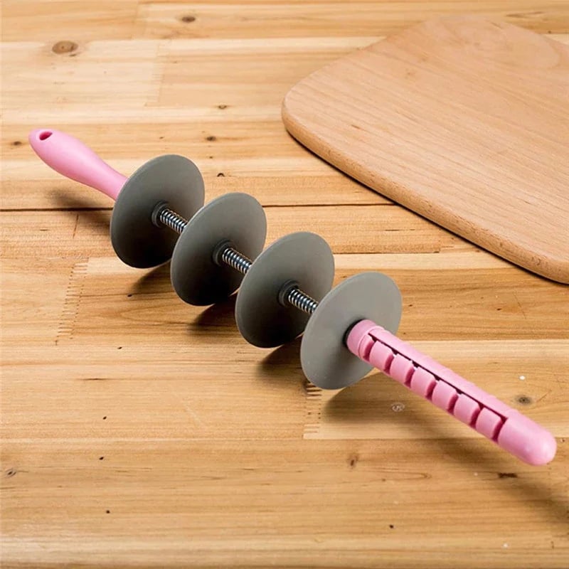 Multi-purpose rolling pin for cutting dough